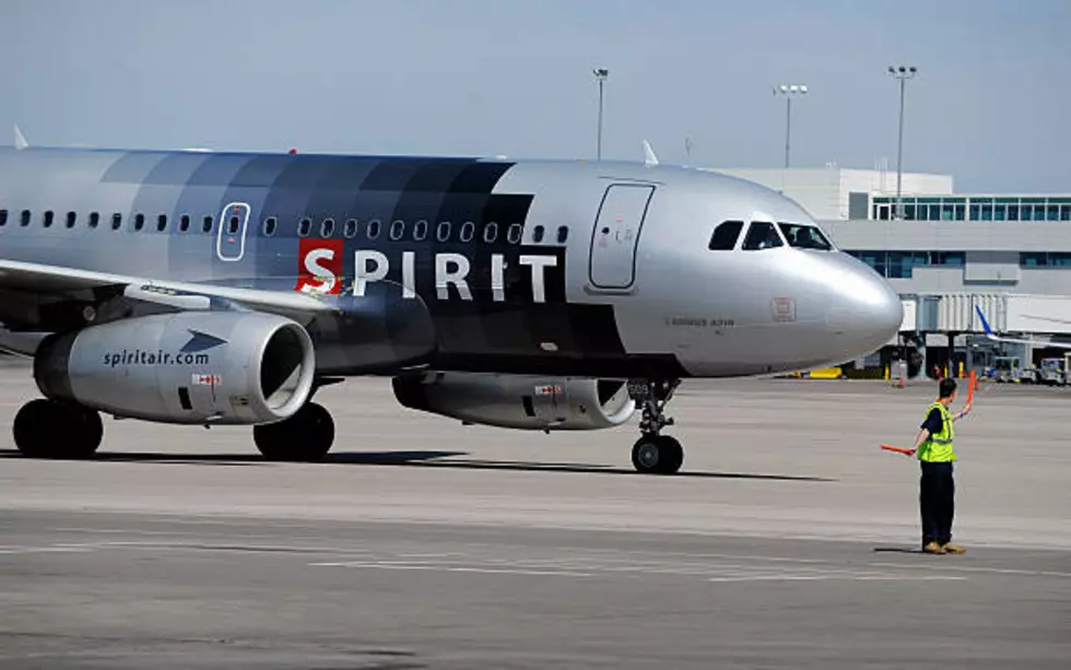 Flight Diverted To DIA After Passenger Tries To Open Door Midair